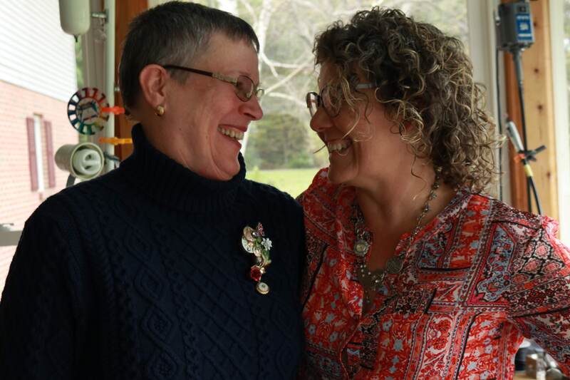 Susan and Janise laugh while sharing stories together. Custom Sentimental Jewelry by Janise Crow, Crows Nest Arts, State College, PA