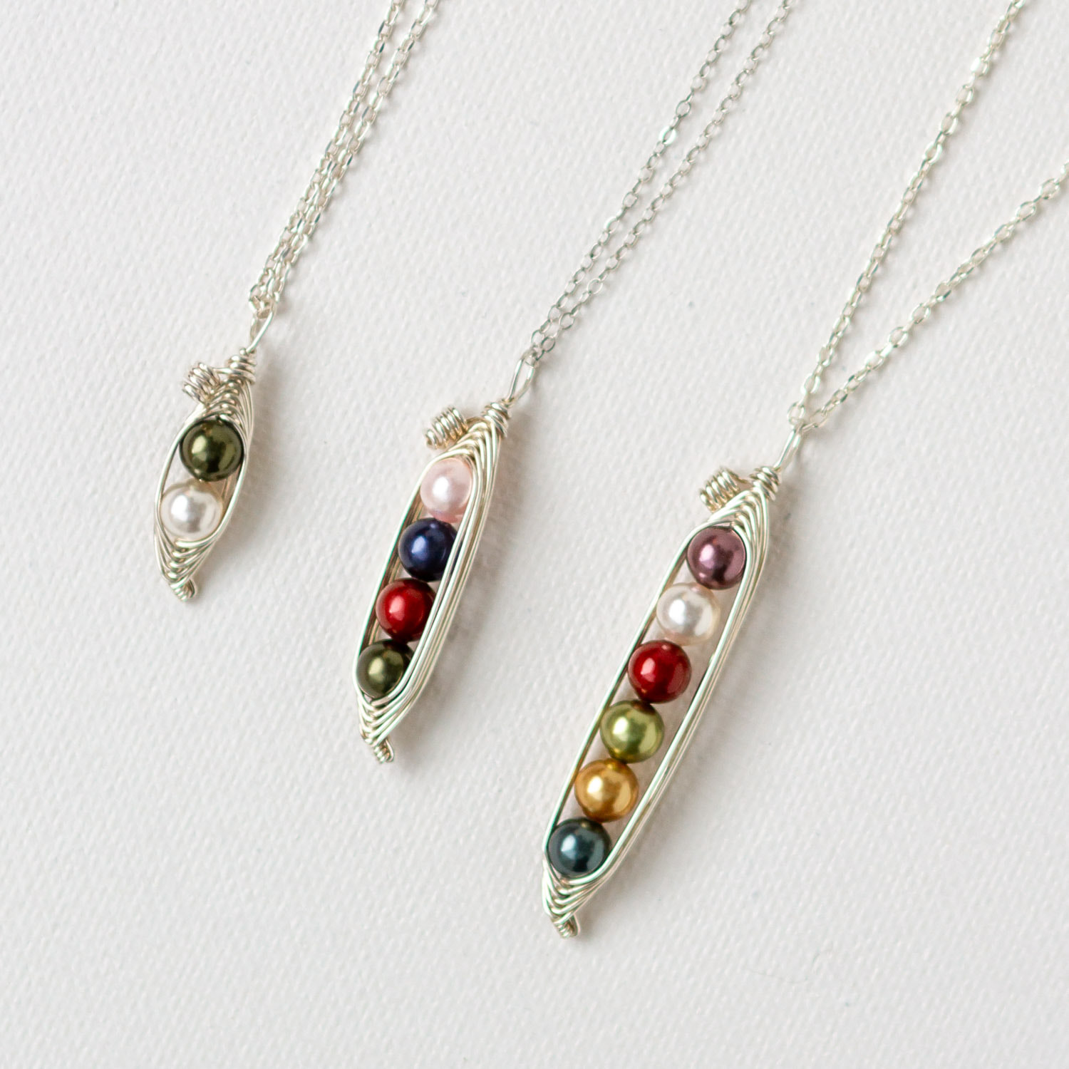 Four peas in a pod necklace – Rising Jewelry by Kiona Elliott